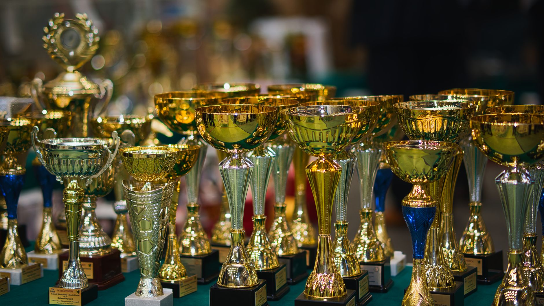 Champions lifting the trophy at a prize presentation